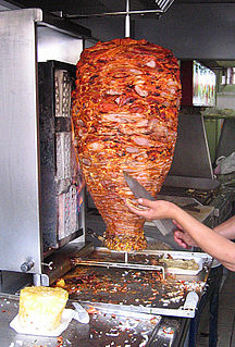 <span class="mw-page-title-main">Al pastor</span> Mexican spit-grilled pork seasoned with adobada