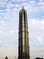 The Jin Mao Tower with the construction of the Shanghai World Financial Center at the background