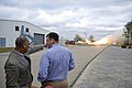 NASA Administrator Charles Bolden (left) and John C. Stennis Space Center Director Patrick Scheuermann view a test firing of the first Aerojet AJ26 flight engine.