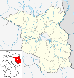 Mapa konturowa Brandenburgii, w centrum znajduje się punkt z opisem „Potsdam Medienstadt Babelsberg”