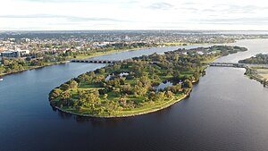 Drone shot of Heirisson Island in the Swan River connected by the Causeway to the East Perth and Victoria Park foreshores