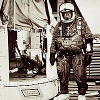 Joseph Kittinger next to the Excelsior gondola. The plaque reads "This Is The Highest Step In The World"