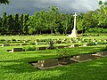 Image 66Chittagong War Cemetery is a Commonwealth War Graves Commission cemetery located at Dampara 22 kilometers north of the airport and 8 kilometers from the port. The burial area is surrounded by a large plantation. A tarmac lane leads from the entrance gate to the burial area which is entered through a metal gate flanked by two small brick chapels. Photo Credit: Hossain Toufique Iftekher