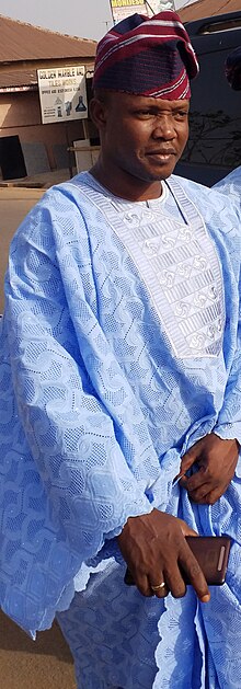 Yoruba man in a type of Agbada Giwa Nurudeen.jpeg