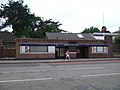 Manor House tube station entrance on the western side of Green Lanes, north of Seven Sisters' Road