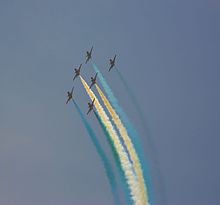 The Sherdils of PAF performing aerial acrobatics during the 2015 parade Pakistan Resolution Day.JPG