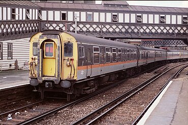 Class 411 no. 1521 at Waterloo East station in 1988, in British Rail's "Jaffa Cake" express livery.