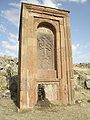 Huge khachkar monument behind Artavazik Church of the 13th century