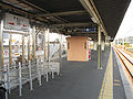 A view of the island platform. Note the elevator shaft in the distance.