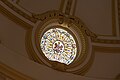 A stained glass window set into the inner dome above the Supreme Court Library, within the Supreme Court of Victoria building.