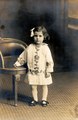 Black and white studio portrait of Violet Archer, age 4