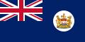 It is proposed that the Hong Kong coat of arms in the white disc be replaced with the badge of Prince Edward Island, based on this pre-1997 Hong Kong Blue Ensign.