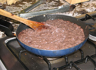 Refried beans Mexican dish of cooked, mashed, and fried beans