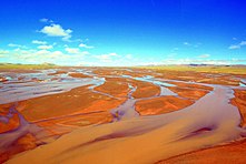 The Tuotuo River, a headwater stream of the Yangtze River, known in Tibetan as Maqu, or the "Red River"