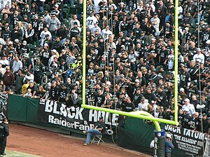 Goal posts with a banner hung behind them reading "Black Hole".