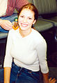 Nikki Cox in a long sleeved T-shirt in the year 2000. They were fashionable from the late 1990’s to the mid 2000’s.