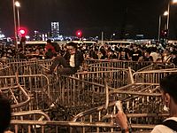 Demonstrators erecting fences to prevent police clearance