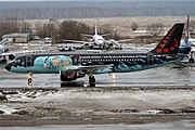 Airbus A320 (OO-SNB) dengan livery Tintin