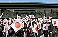 Emperor Akihito greets the crowd at the Imperial Palace on his birthday, December 23, 2004.