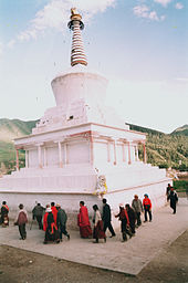 Circumambulation of a chorten by visitors Labrang03.jpg