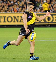 Prestia kicks during play in round 2, 2017 Prestia kicking.1 (cropped).jpg