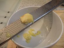 A Microplane surform rasp used to grate fresh ginger Zester.jpg