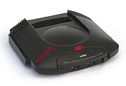 Atari Jaguar games console sitting at a slight angle