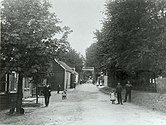 Foto (uit 1907) gezien naar het zuiden, met de ophaalbrug op de achtergrond