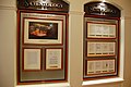 An exposition inside the Scientology building proudly displays the IRS ruling over Scientology's tax-exempt status under the header "U.S government recognition". The second panel is devoted to international recognition.