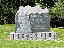 stone monument with an engraving of a woman