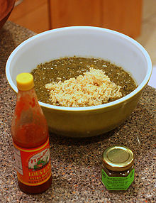 Gumbo z'herbes, served with file powder and hot sauce Zherbes.jpg