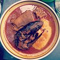 Fufu Ghana với xúp, thịt dê và cá hun khói