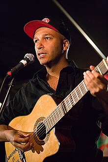 Morello performing as The Nightwatchman in May 2006 Tom-morello.jpg