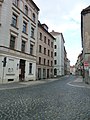 Straßen der Historischen Altstadt mit Bürgersteigen und Granitpflasterungen