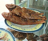 Ikan goreng is a generic term that refers to various kinds of Indonesian and Malaysian dishes of deep fried fish or other forms of seafood. Goreng ikan merah Palopo.JPG