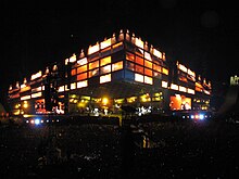 Muse performing at Wembley Stadium using the triangular stage. Musetheresistancetourwembleystadium.jpg