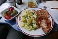 Image 44Baked potatoes with steak and cucumber salad (from Culture of Romania)