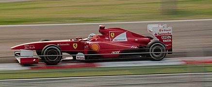 Fernando Alonso racing at Buddh in 2011