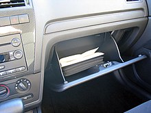 Glove compartment of a Ford Fusion with an owner's manual visible Glove-box.jpg