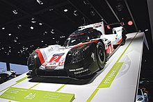 Race car on a white indoor ramp