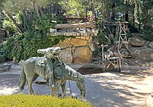 At the shallow basin to the Maynard's Mountain waterfall, Paso Robles Event Center displays a thousand-pound, clay-sculpted bronze statue of a horseback cowboy seeking a drink, entitled "Cool Water." CoolWaterBronzeStatueInPasoRoblesEventCenter.jpg