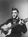 Image 1Elvis Presley in 1956, a leading figure of rock and roll and rockabilly. (from 20th century)