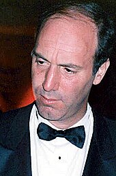 Color photo of a man in a tuxedo.