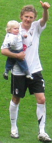 Bullard at Fulham with his son in 2008 Jimmy Bullard.png