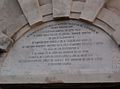 The inscription above the fortress gates.