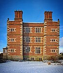 Soulton Hall, the architectural project of Sir Rowland Hill (d.1561) who is memorialisd at Hawkstone which was also part of his estate - the park sets up views to this building