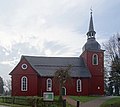 Evangelische Kirche in Hohegeiß mit Dennert-Tanne an der Außenwand des Turms