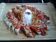 A plate of beyti kebab from Ankara Beyti in a tray at Ankara.jpg