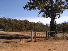 Nature park entrance to Red Hill reserve showing typical fencing CanberraNatureParkRedHill.JPG