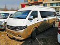 A Zhongtong LCK6600BEV5 (possibly unlicensed clone of Toyota HiAce H200 high roof van)